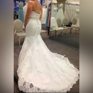 Wedding gown never worn still in bag with tags